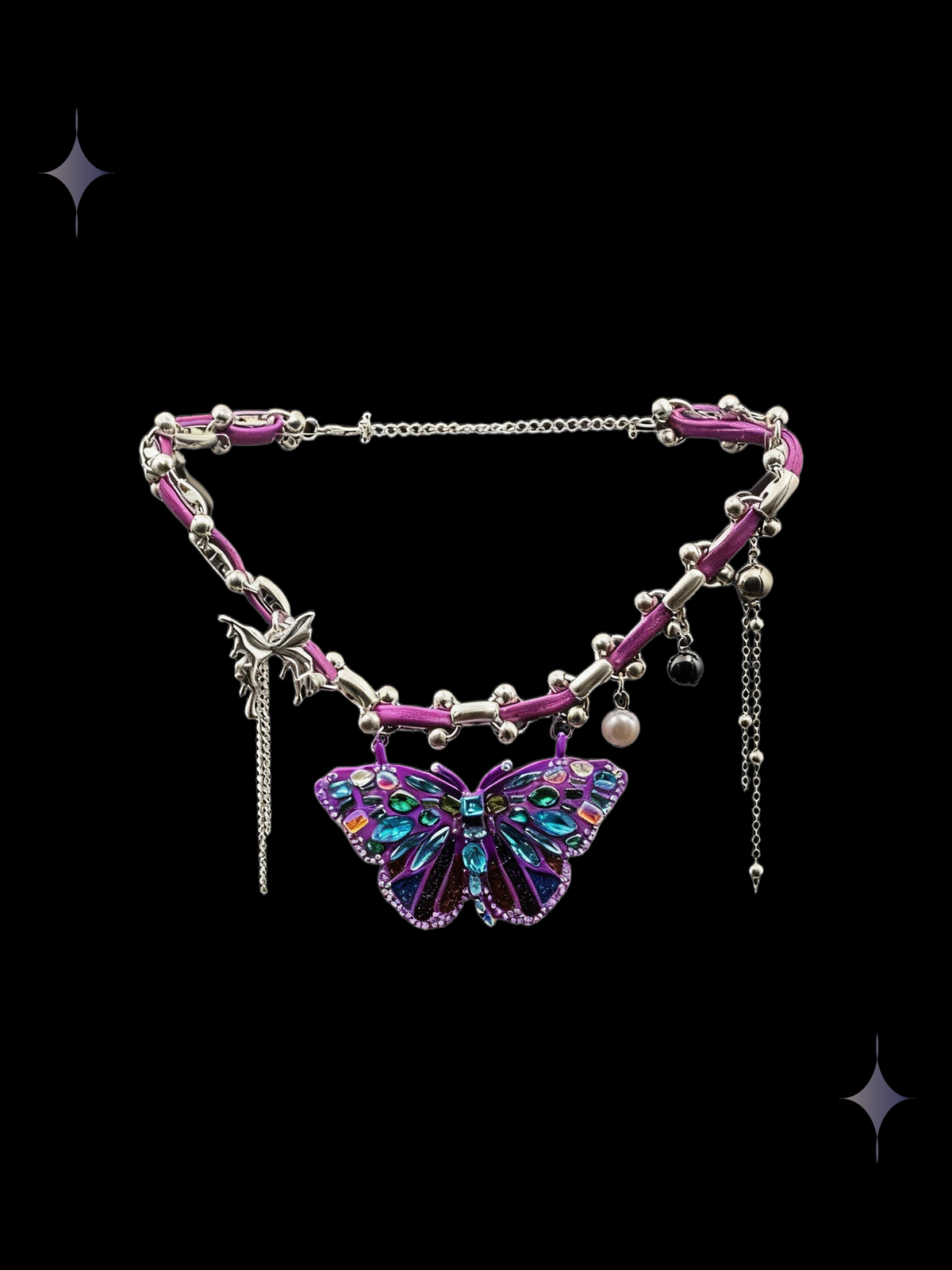 Amethyst Butterfly purple butterfly statement necklace with purple ribbon, faux pearl accents, and silver-tone chain fringe on a black background