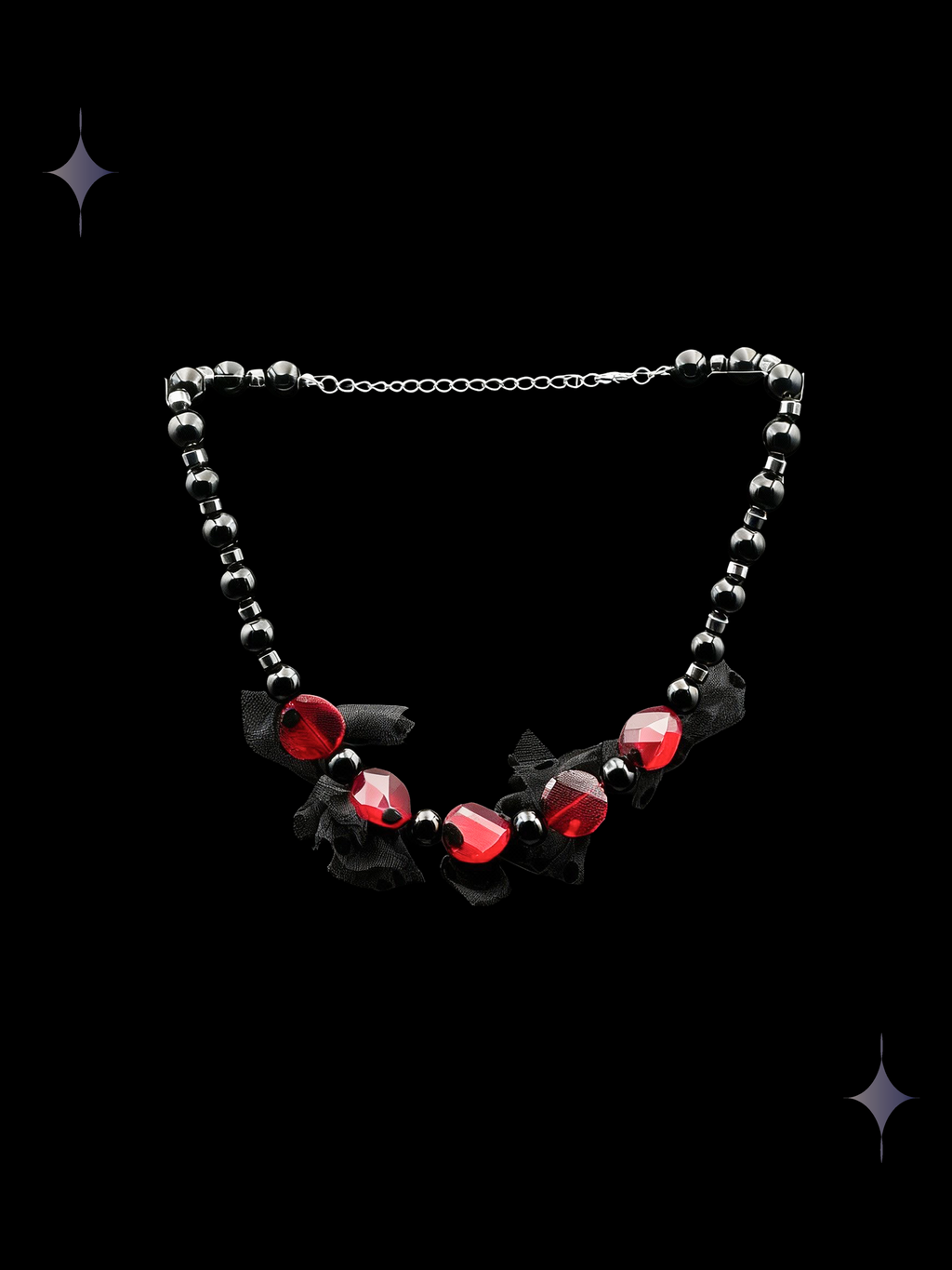 Black Cherry gothic red and black beaded necklace with faceted faux crystals, black ribbon details, and silver-tone accents on a black background