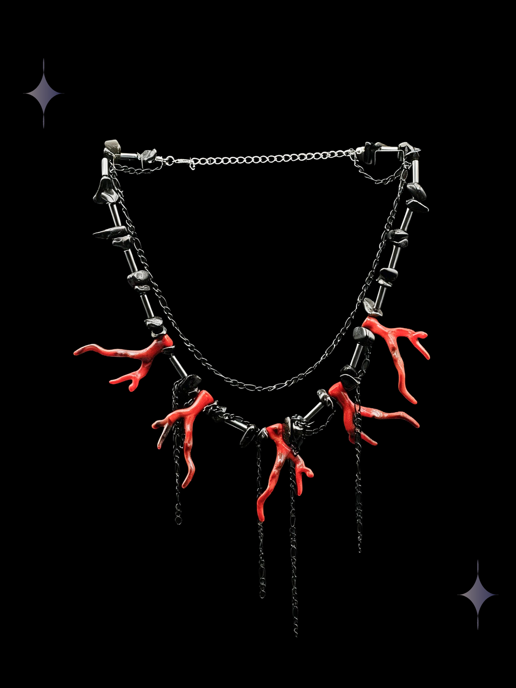 Red Claw gothic red statement necklace with black beads, silver-tone chains, and vivid claw-shaped charms on a black background